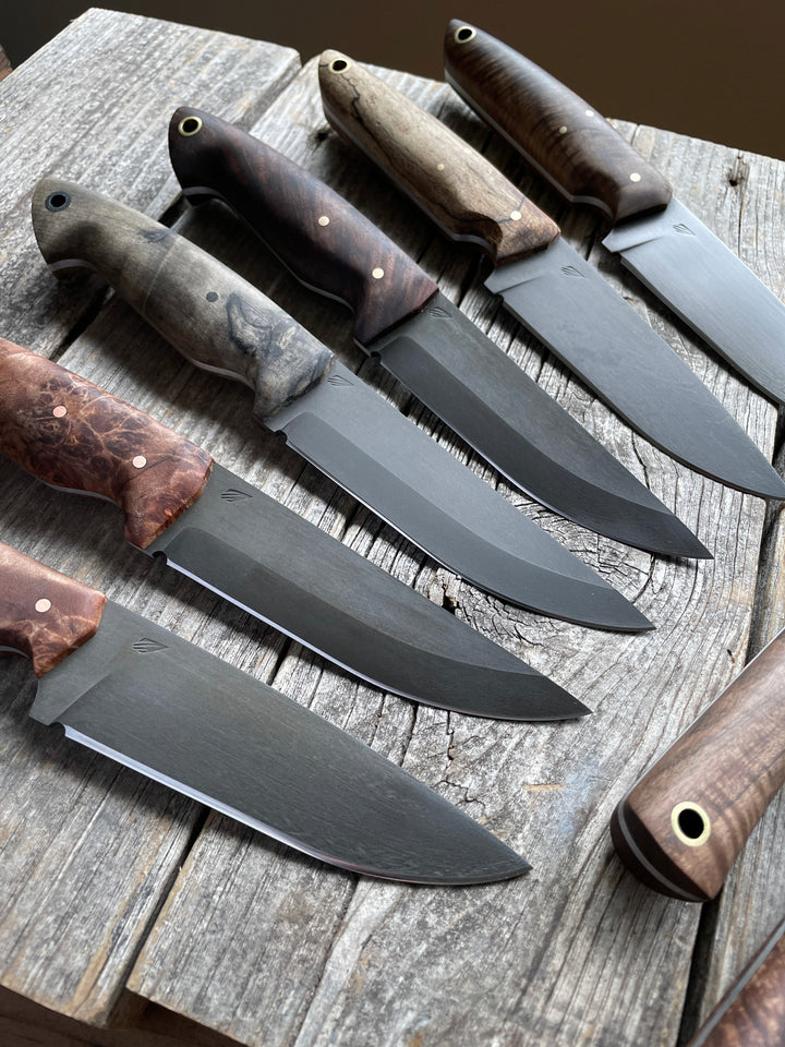 Outdoor knives for camping and Bushcraft. Carbon steel camp knife. Flat grind and sabre grind. 