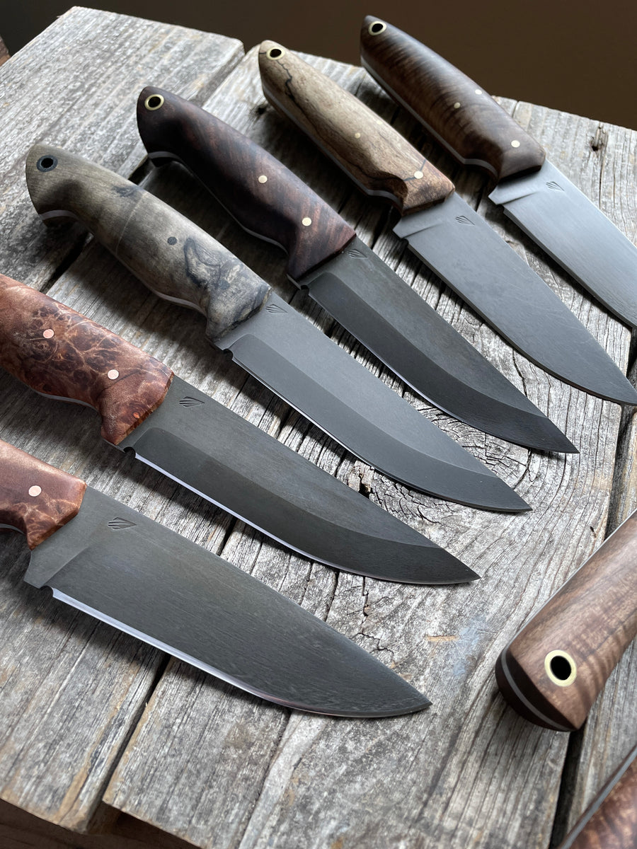 Outdoor knives for camping and Bushcraft. Carbon steel camp knife. Flat grind and sabre grind. 