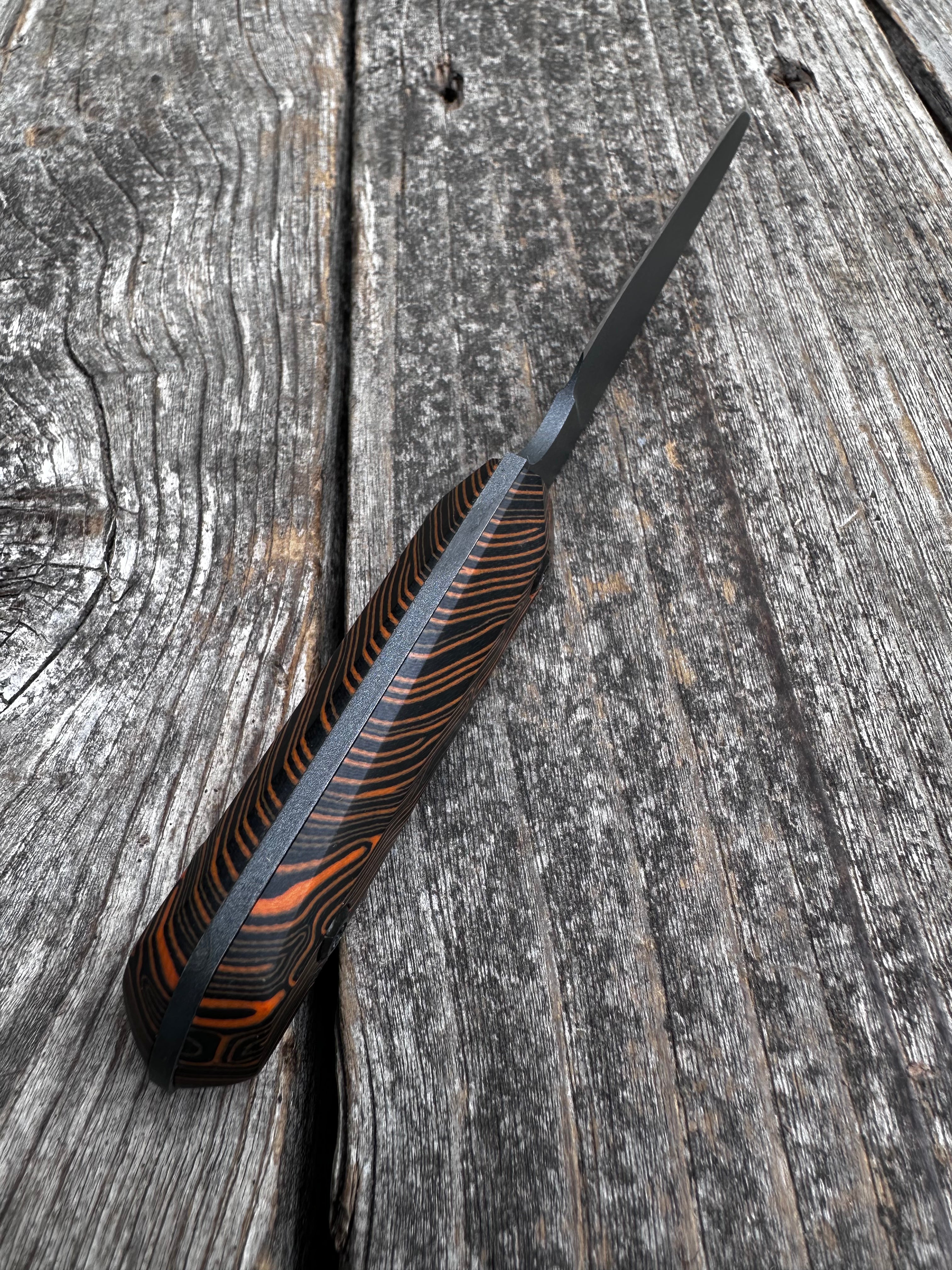 Ocelot Pocket EDC knife — Coral G10 & Cerakote